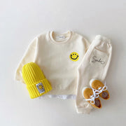 Bezauberndes Baby-Trainingsanzug-Set mit Smiley-Print