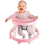Baby in a pink walker on a white background