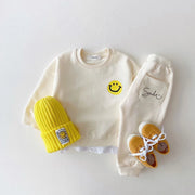 Bezauberndes Baby-Trainingsanzug-Set mit Smiley-Print