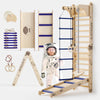 A children's wooden climbing gym set displayed on a white background, including a tall ladder with blue steps, a rope wall climber, a small A-frame ladder, rings, a balance board, and a child in a space suit standing in front of the main structure. The main unit is labeled 'APOLLO II'.